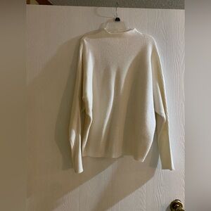 Cyrus Cream Turtleneck Sweater